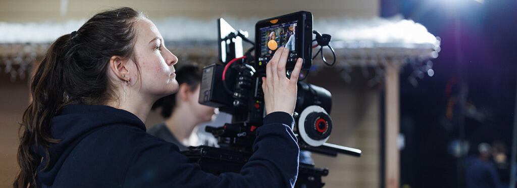 Students working on the Junior Feature Set, a feature film that Juniors work on every spring